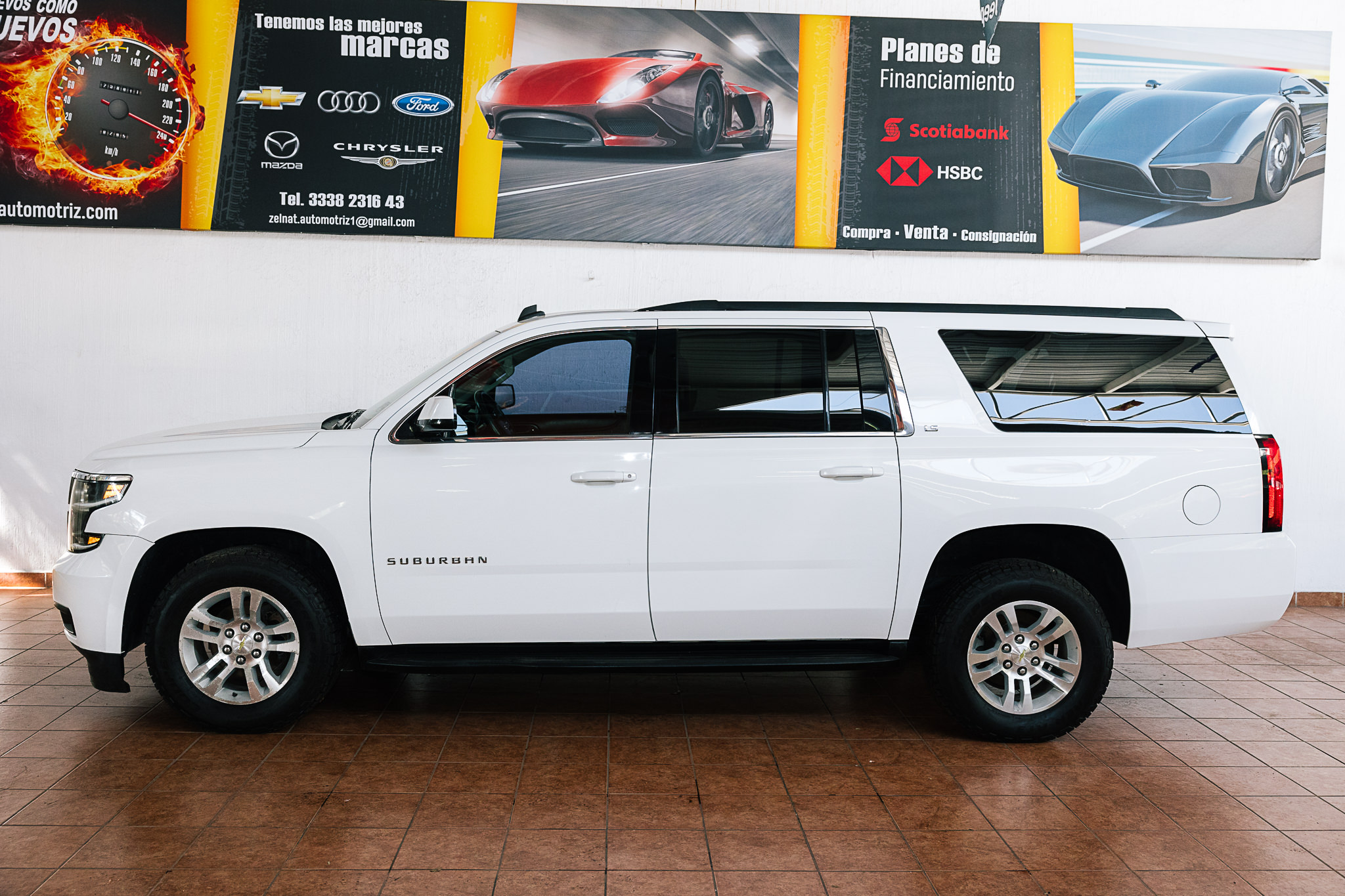 CHEVROLET SUBURBAN 2015 BONO DE $ 30,000