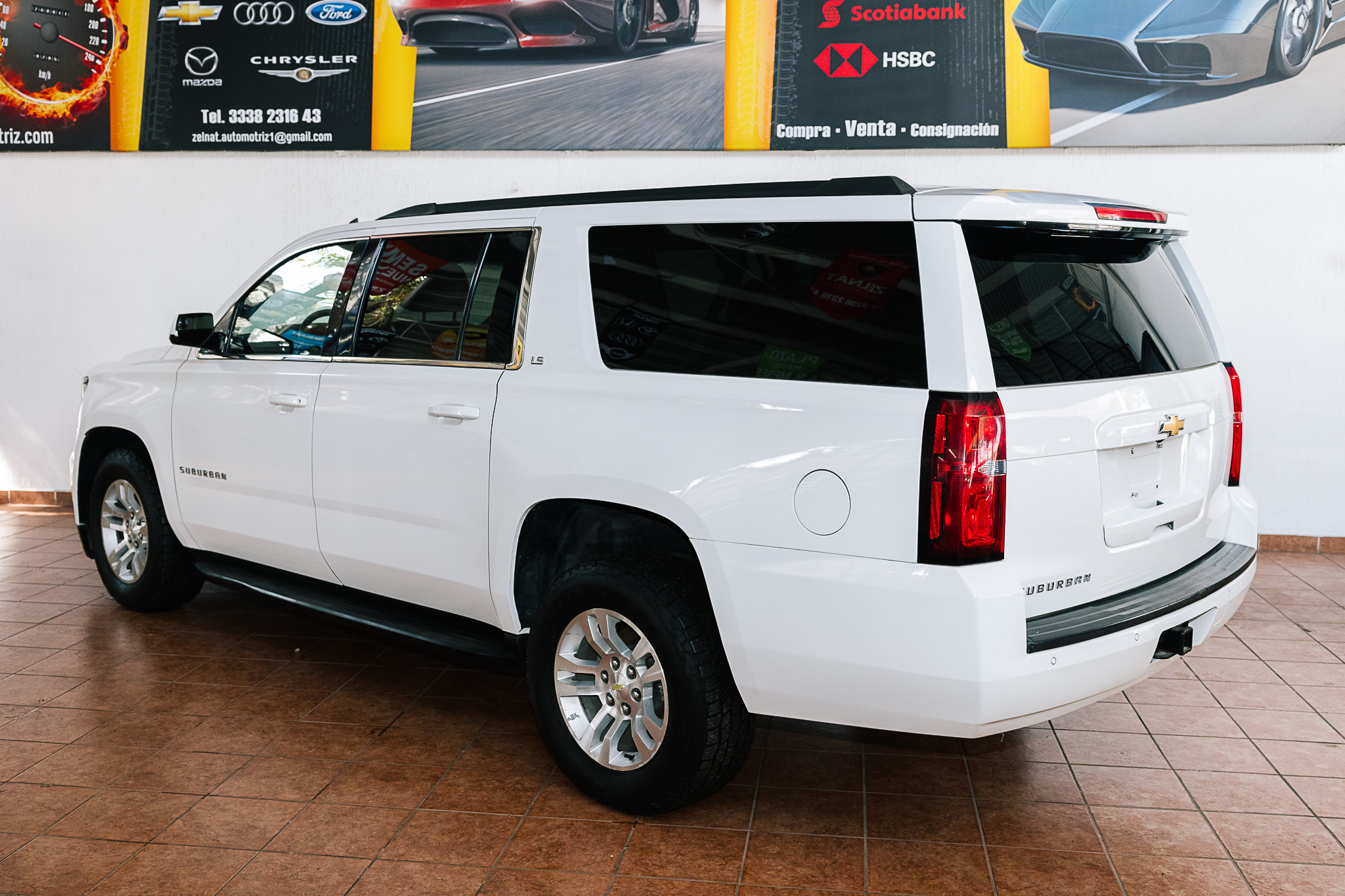 CHEVROLET SUBURBAN 2015 BONO DE $ 30,000