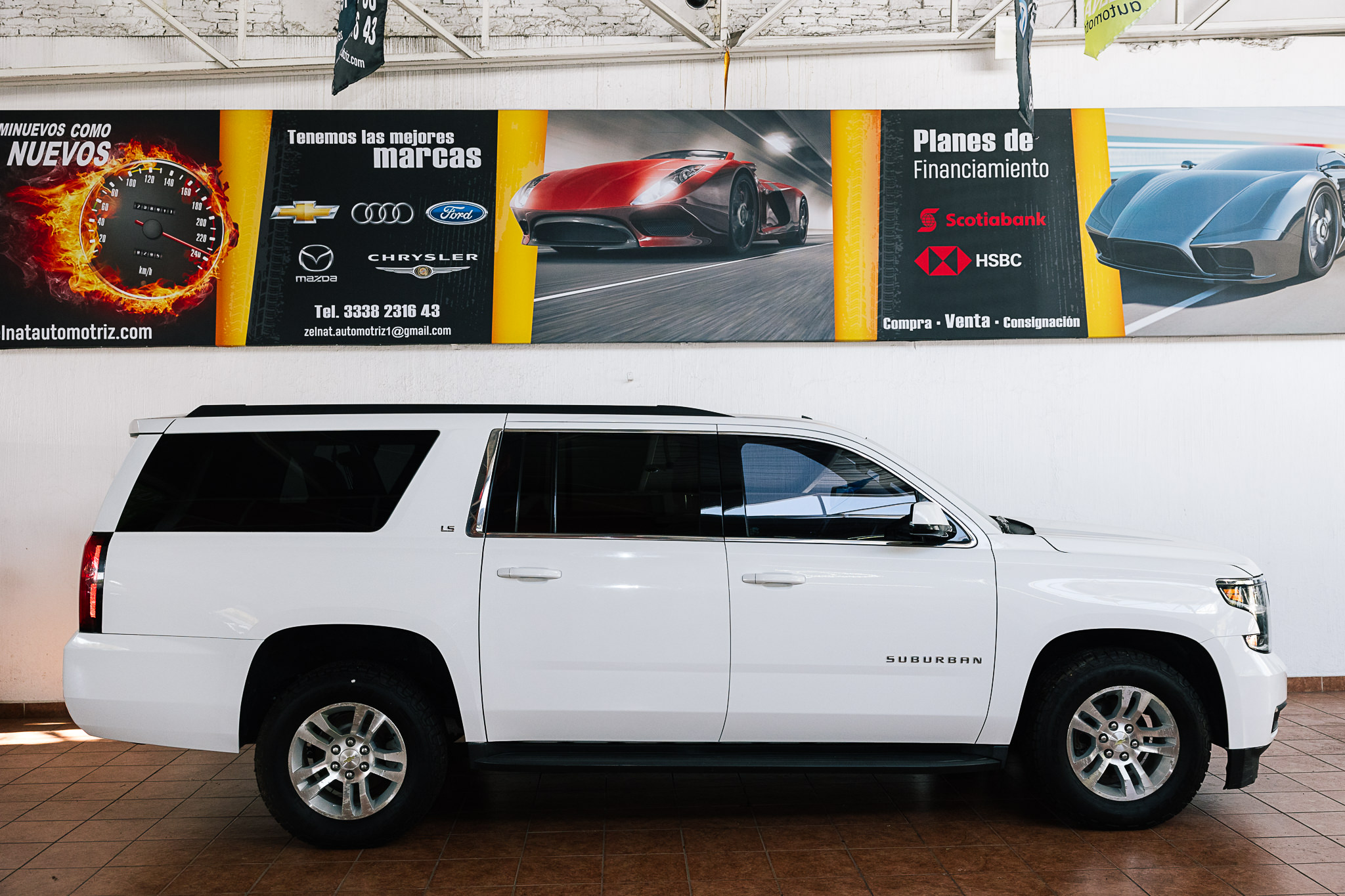CHEVROLET SUBURBAN 2015 BONO DE $ 30,000