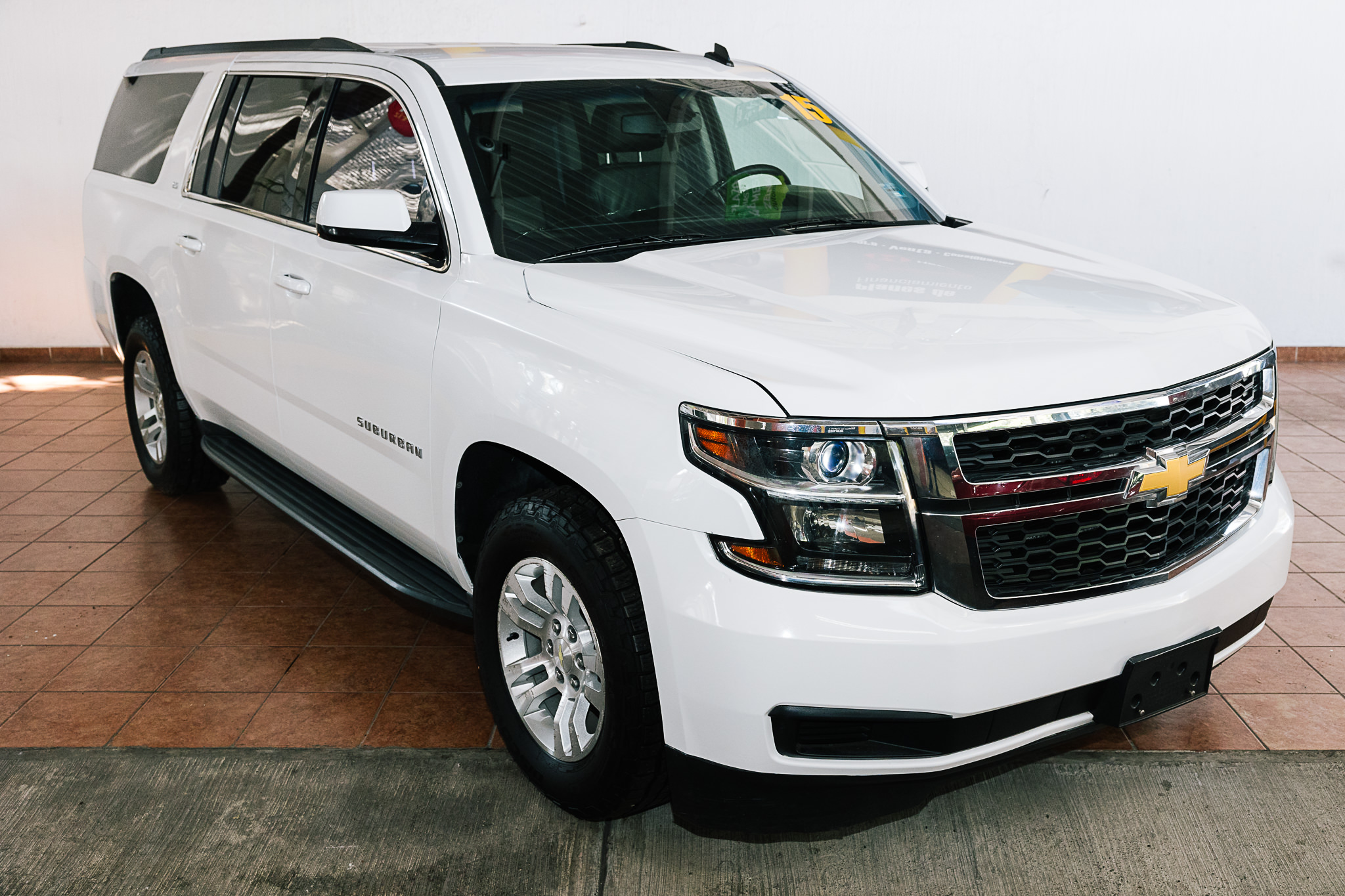 CHEVROLET SUBURBAN 2015 BONO DE $ 30,000